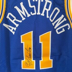 Autographed BJ Armstrong jersey